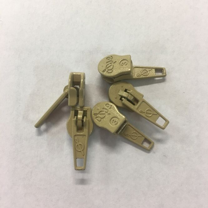 Hovedbilde Glidere 4mm - beige 5 pack